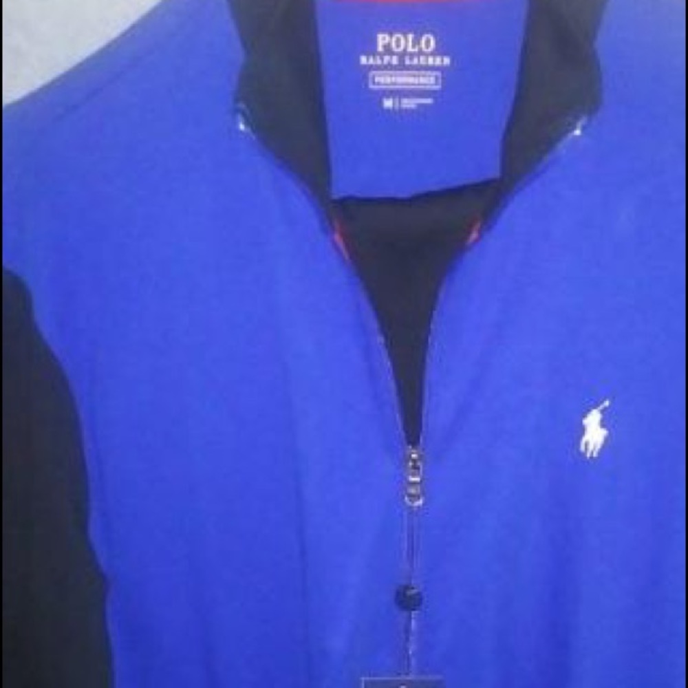 Men's Medium Polo Track Suit. NWT. 150 firm.   It’s blue & red. Fits XL woman